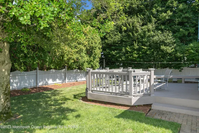 a view of a chair and backyard
