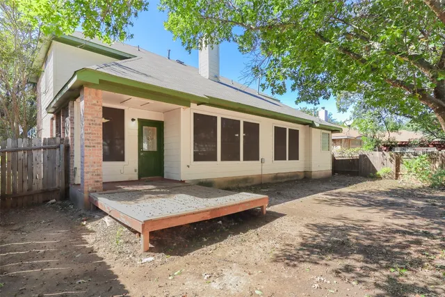 a view of a yard with trees