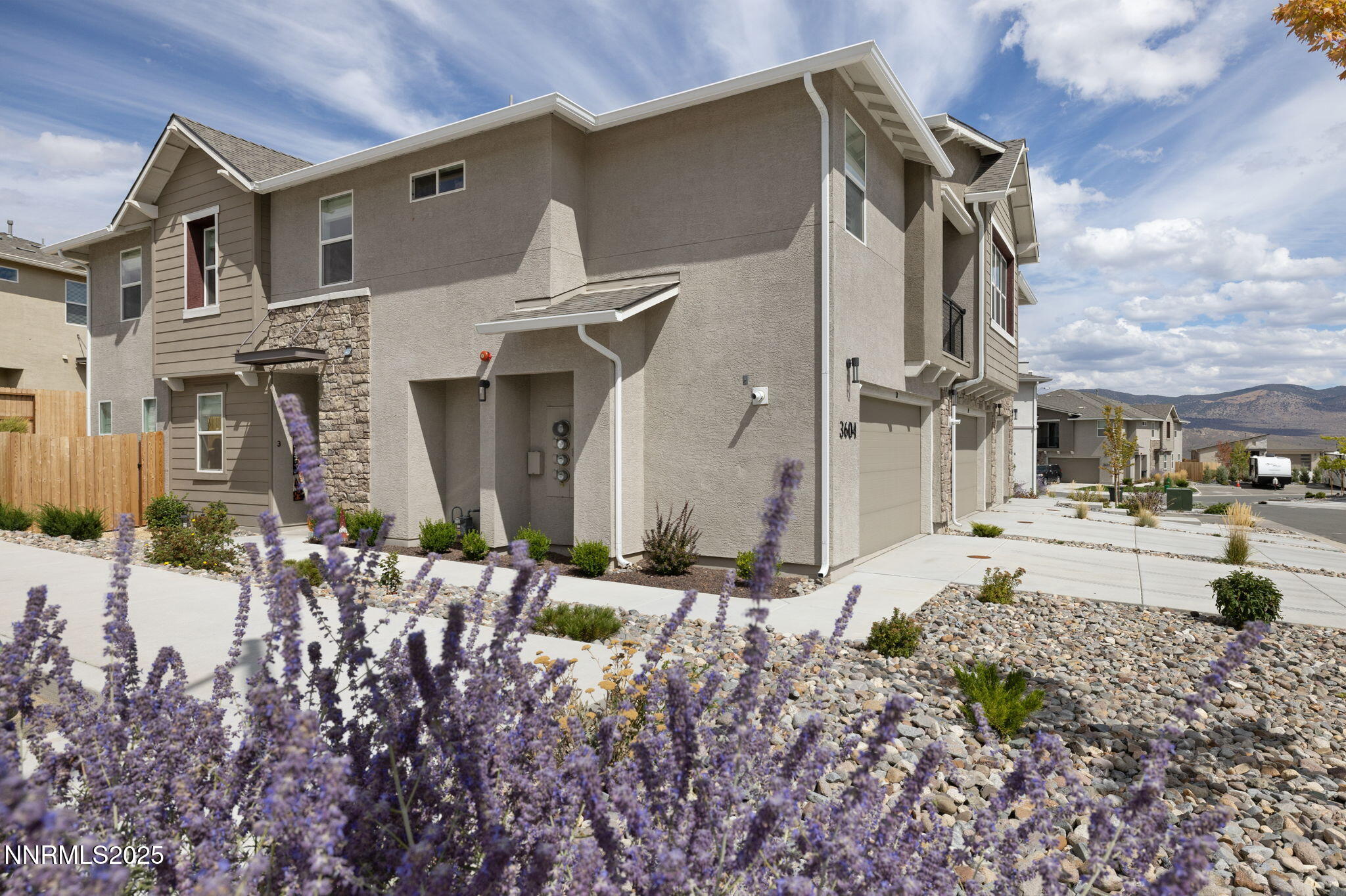 3604 Pulsar Lane, Unit 3 Carson City, NV 89705 - Photo 25 of 59 a front view of a house with a yard