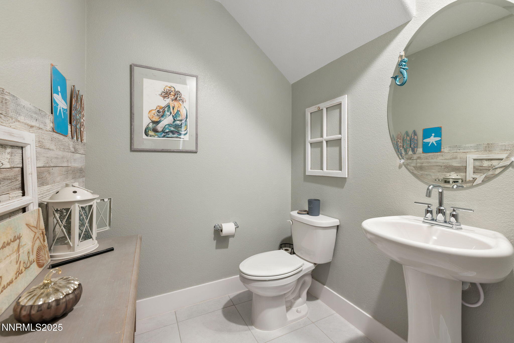 3604 Pulsar Lane, Unit 3 Carson City, NV 89705 - Photo 38 of 59 a bathroom with a toilet a sink and mirror