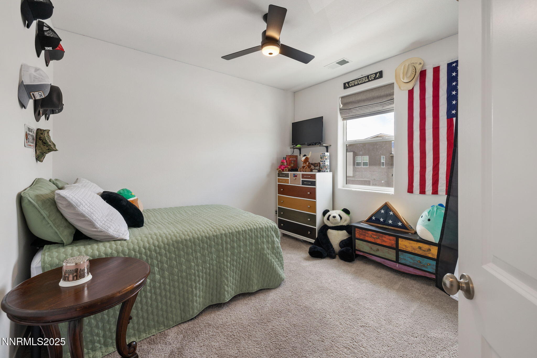 3604 Pulsar Lane, Unit 3 Carson City, NV 89705 - Photo 41 of 59 a bedroom with furniture and a window