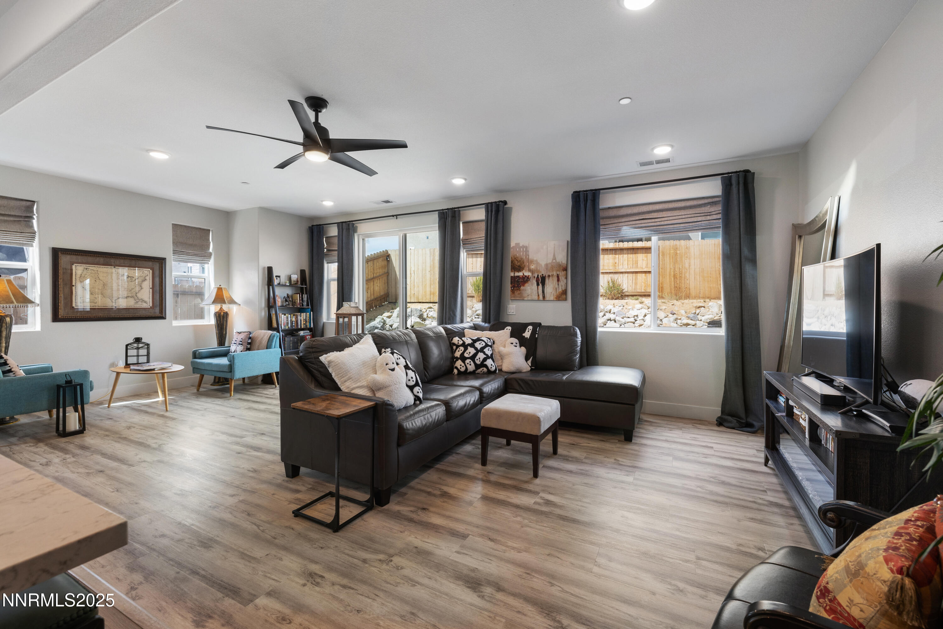 3604 Pulsar Lane, Unit 3 Carson City, NV 89705 - Photo 10 of 59 a living room with furniture flat screen tv and window