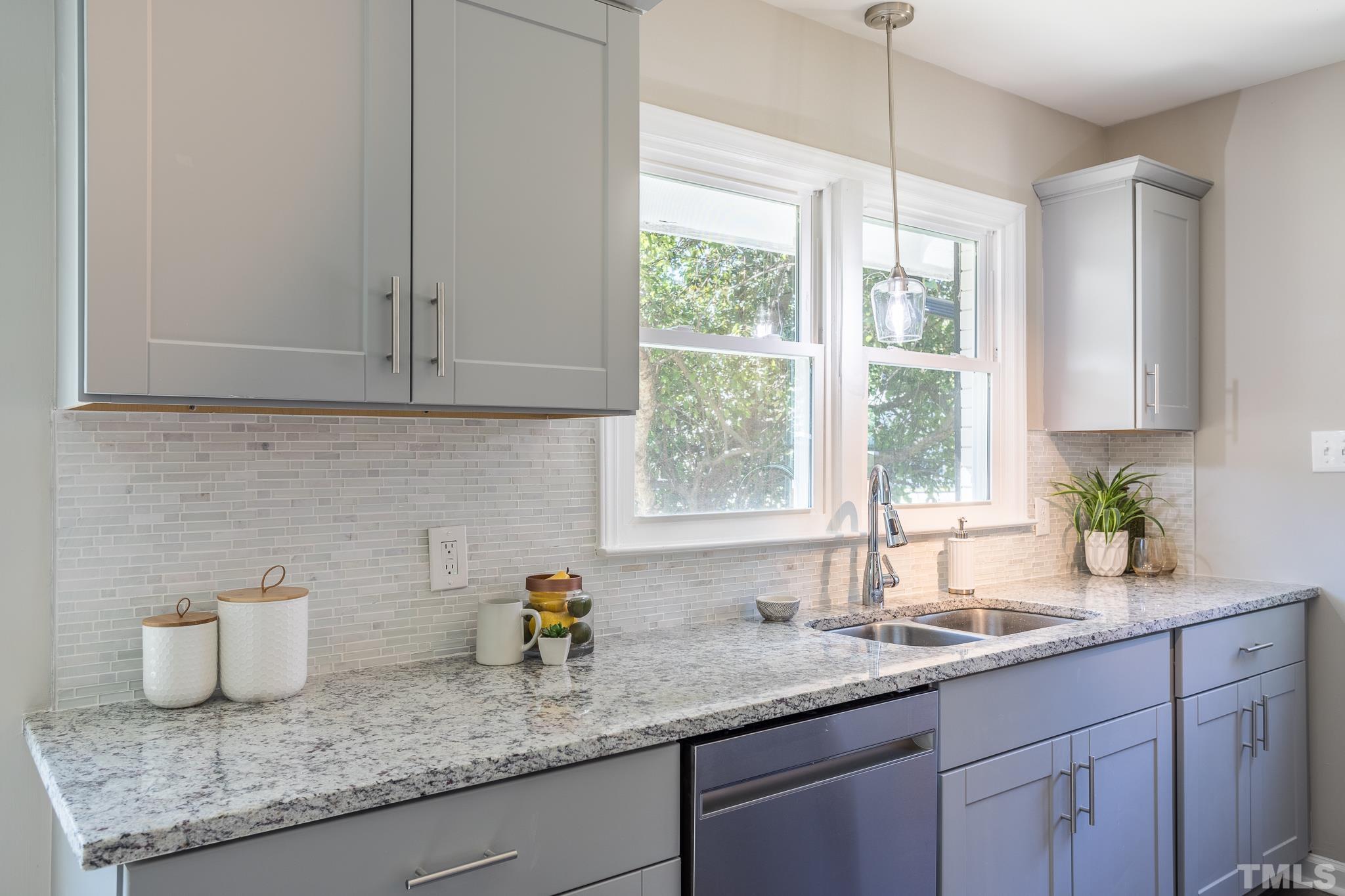 3705 Buffaloe Road Raleigh, NC 27604 - Photo 6 of 25 a kitchen with sink and window