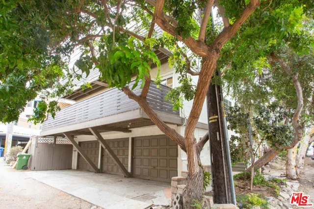 a house with trees in front of it