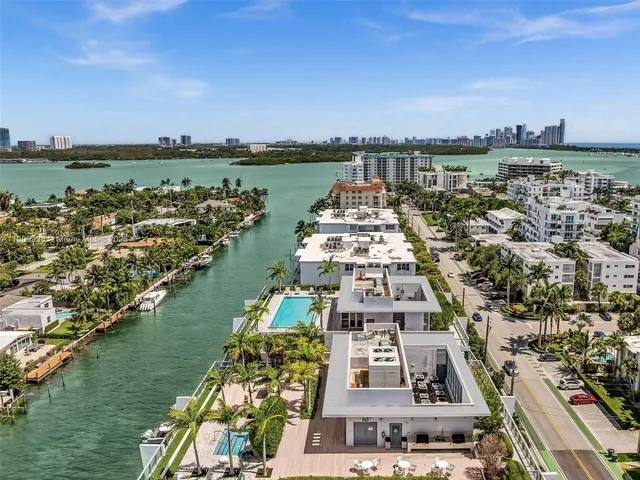 a view of a city with a lake