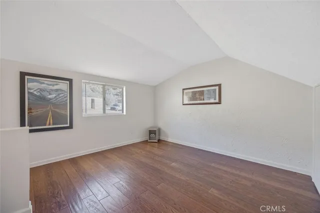 a view of a road with a mountain in the background