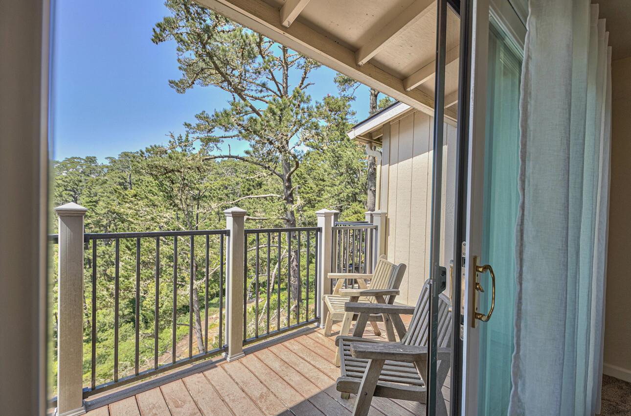 250 Forest Ridge Road, Unit 64 Monterey, CA 93940 - Photo 19 of 35 a view of a balcony with chairs