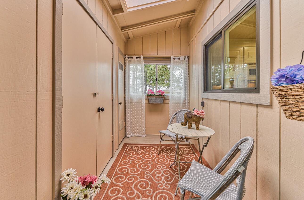 250 Forest Ridge Road, Unit 64 Monterey, CA 93940 - Photo 33 of 35 a bedroom with furniture and a window