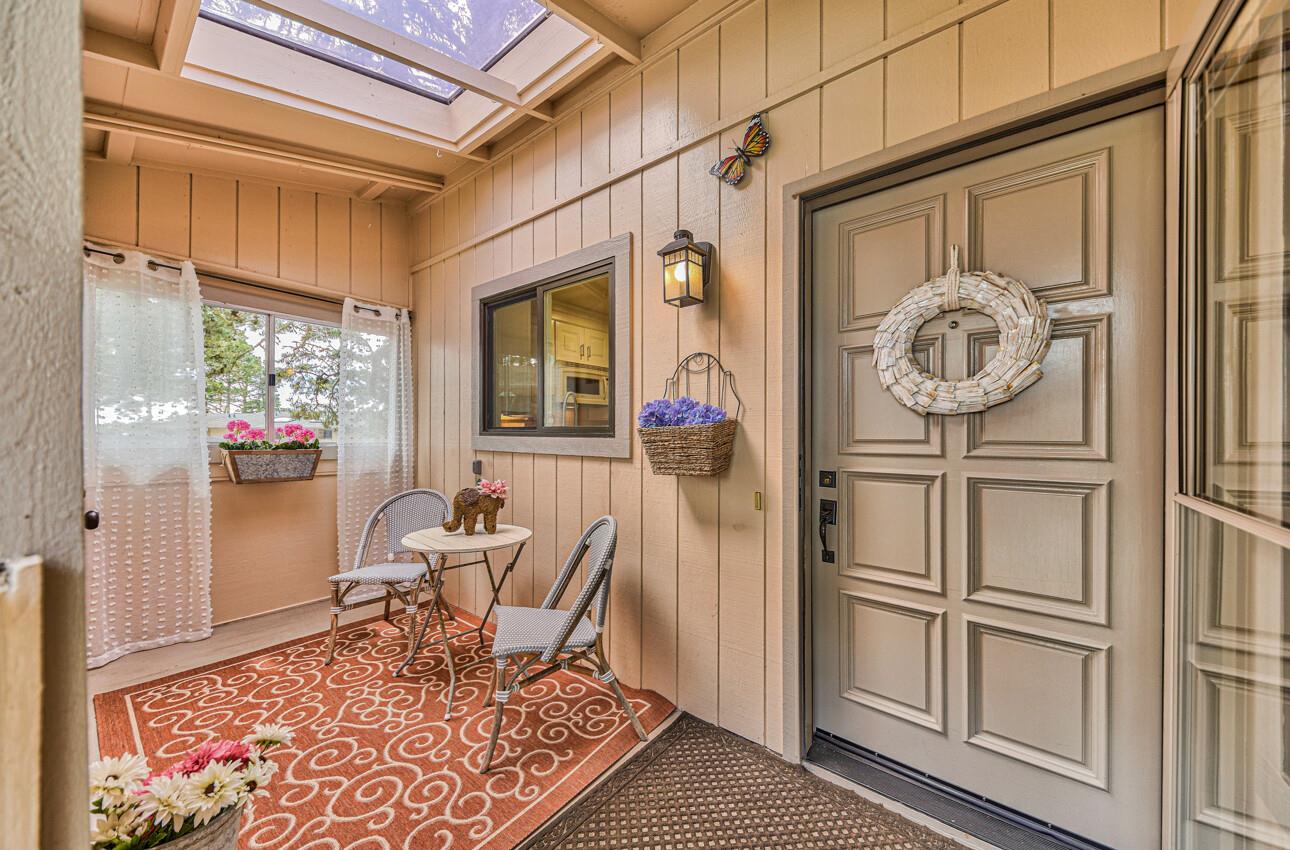 250 Forest Ridge Road, Unit 64 Monterey, CA 93940 - Photo 4 of 35 a living room with furniture and a window