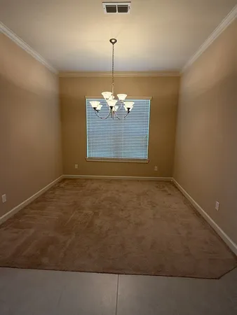 a room with window and fireplace