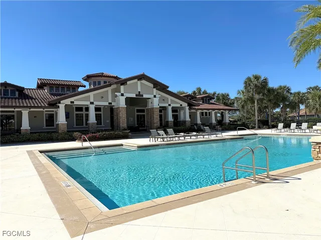 a front view of a house with swimming pool