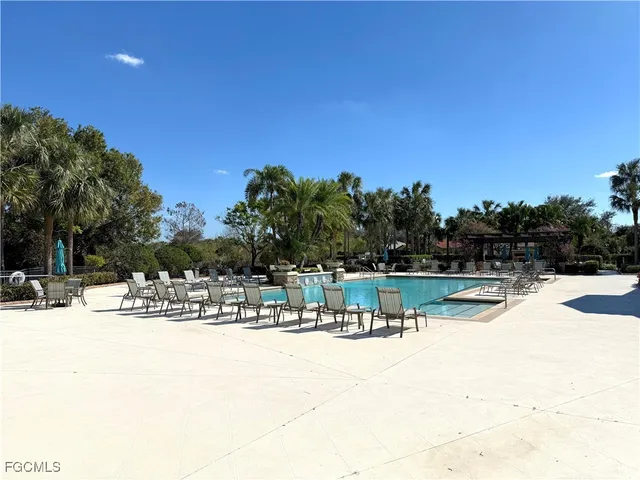 a patio view with a table and chairs