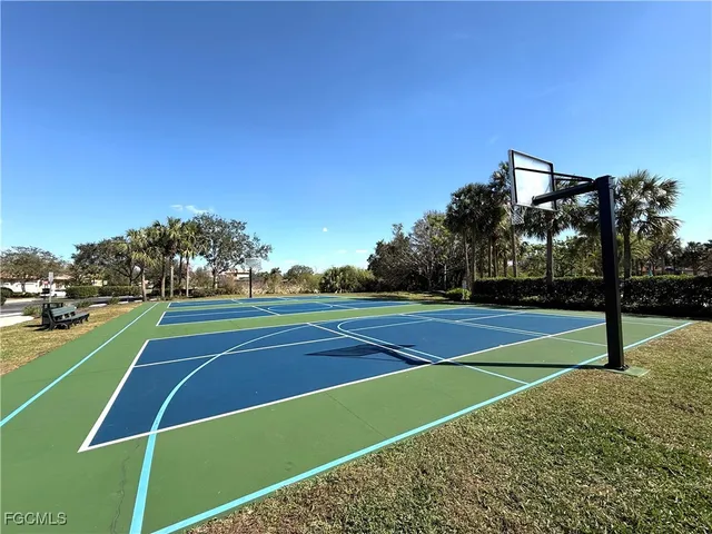 a view of a house with snow on the road