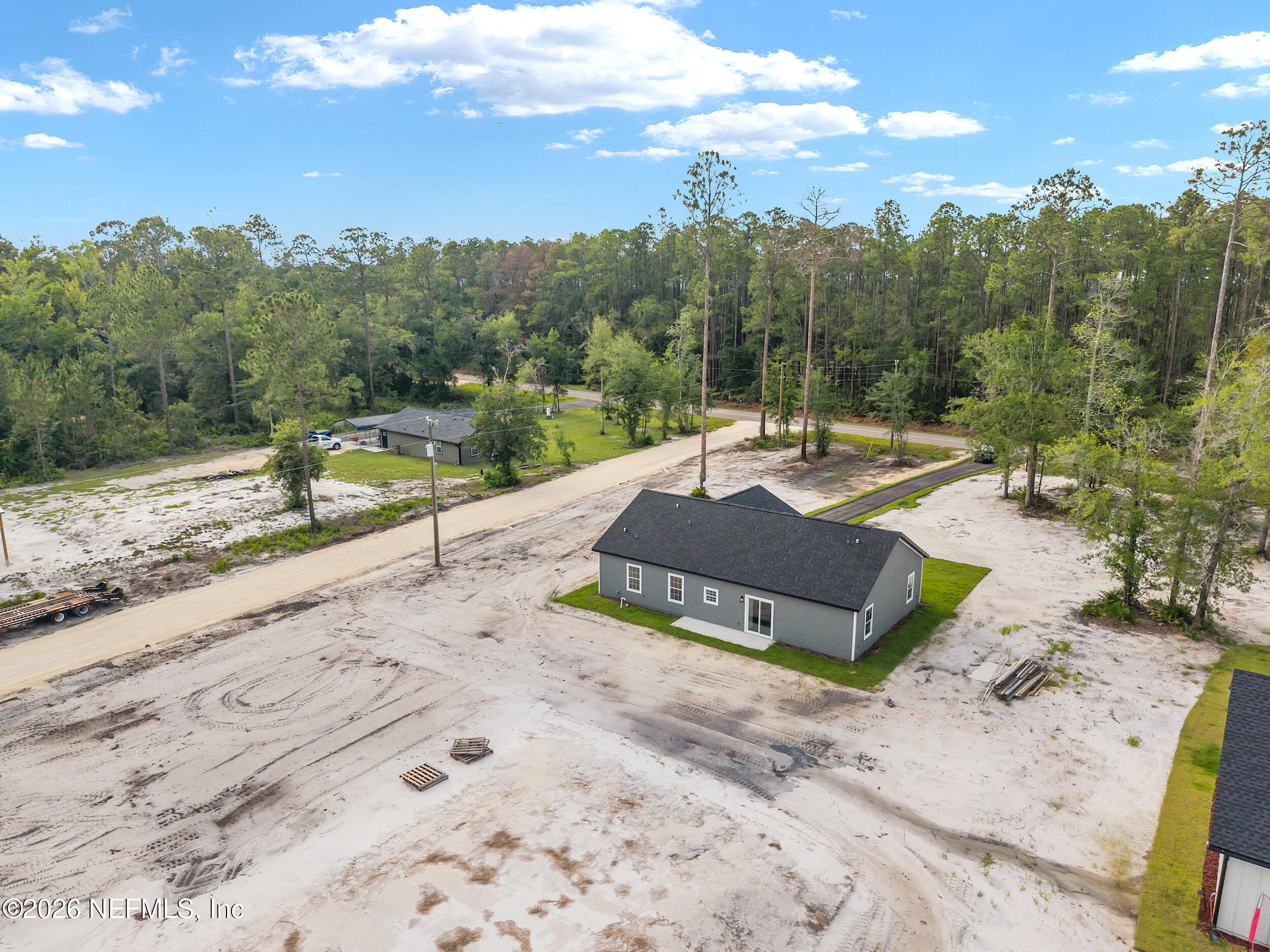 9284 Southwest Sw Cr Hampton, FL 32044 - Photo 42 of 48 DJI_20260625184415_0348_D