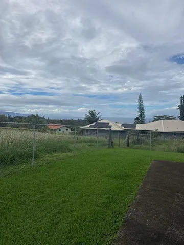 a view of a golf course with a garden