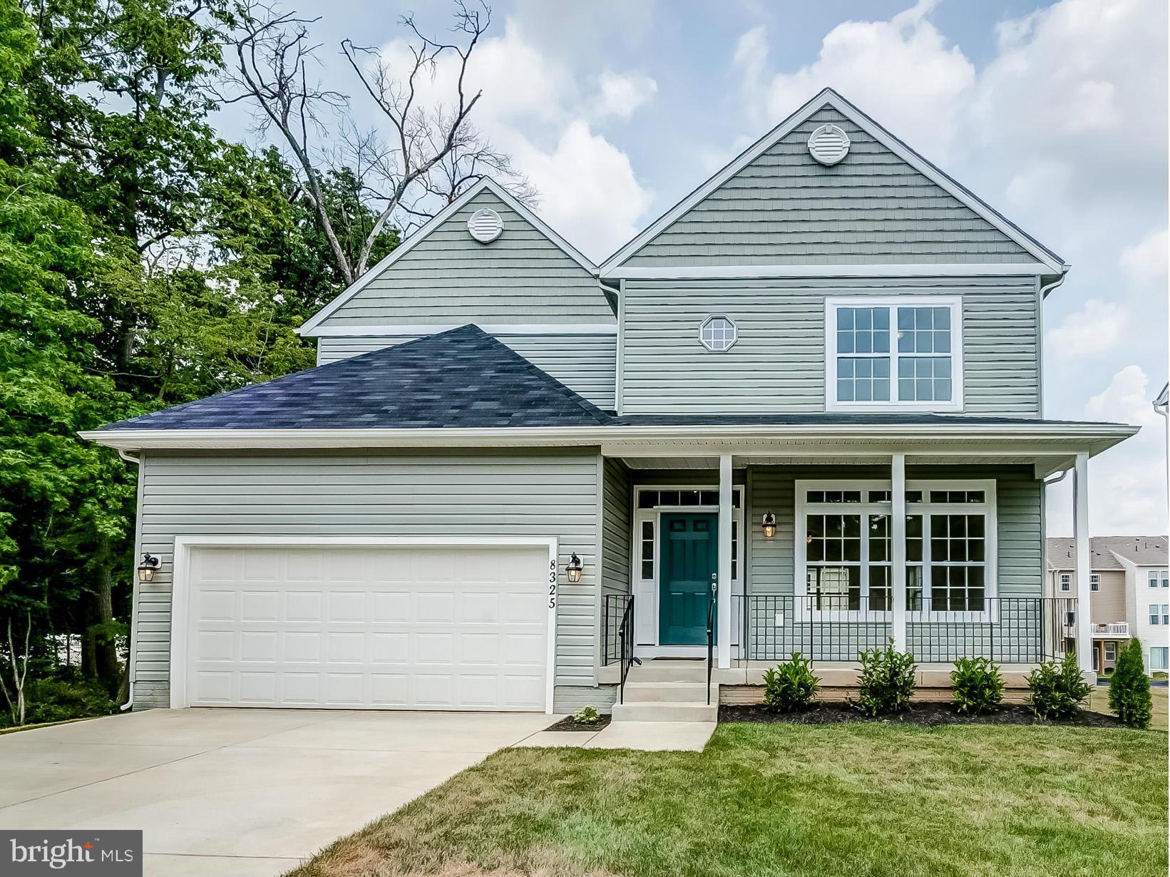 8325 Jacobs Road West Severn, MD 21144 - Photo 1 of 27 EXTERIOR FRONT - PORCH AND 2-CAR GARAGE
