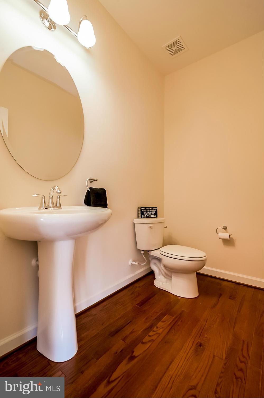 8325 Jacobs Road West Severn, MD 21144 - Photo 9 of 27 POWDER ROOM ON MAIN LEVEL
