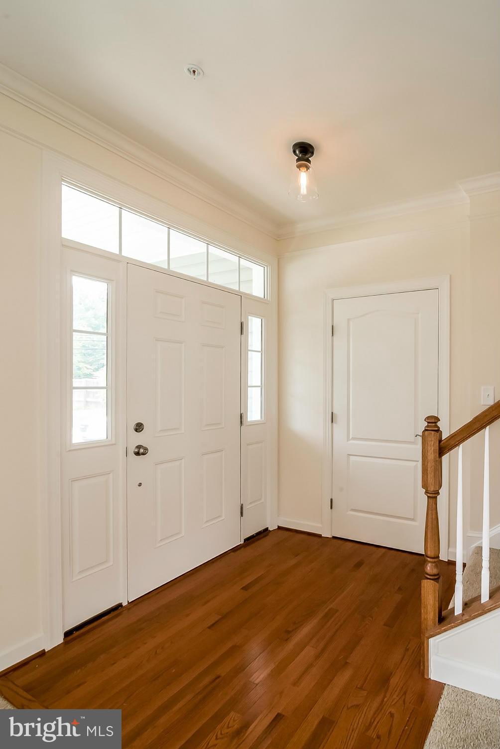 8325 Jacobs Road West Severn, MD 21144 - Photo 3 of 27 FOYER WITH GLEAMING HARDWOOD FLOORS