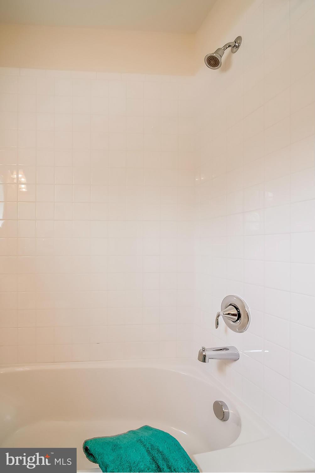 8325 Jacobs Road West Severn, MD 21144 - Photo 22 of 27 CERAMIC TILE FLOOR AND SHOWER TILE SURROUND