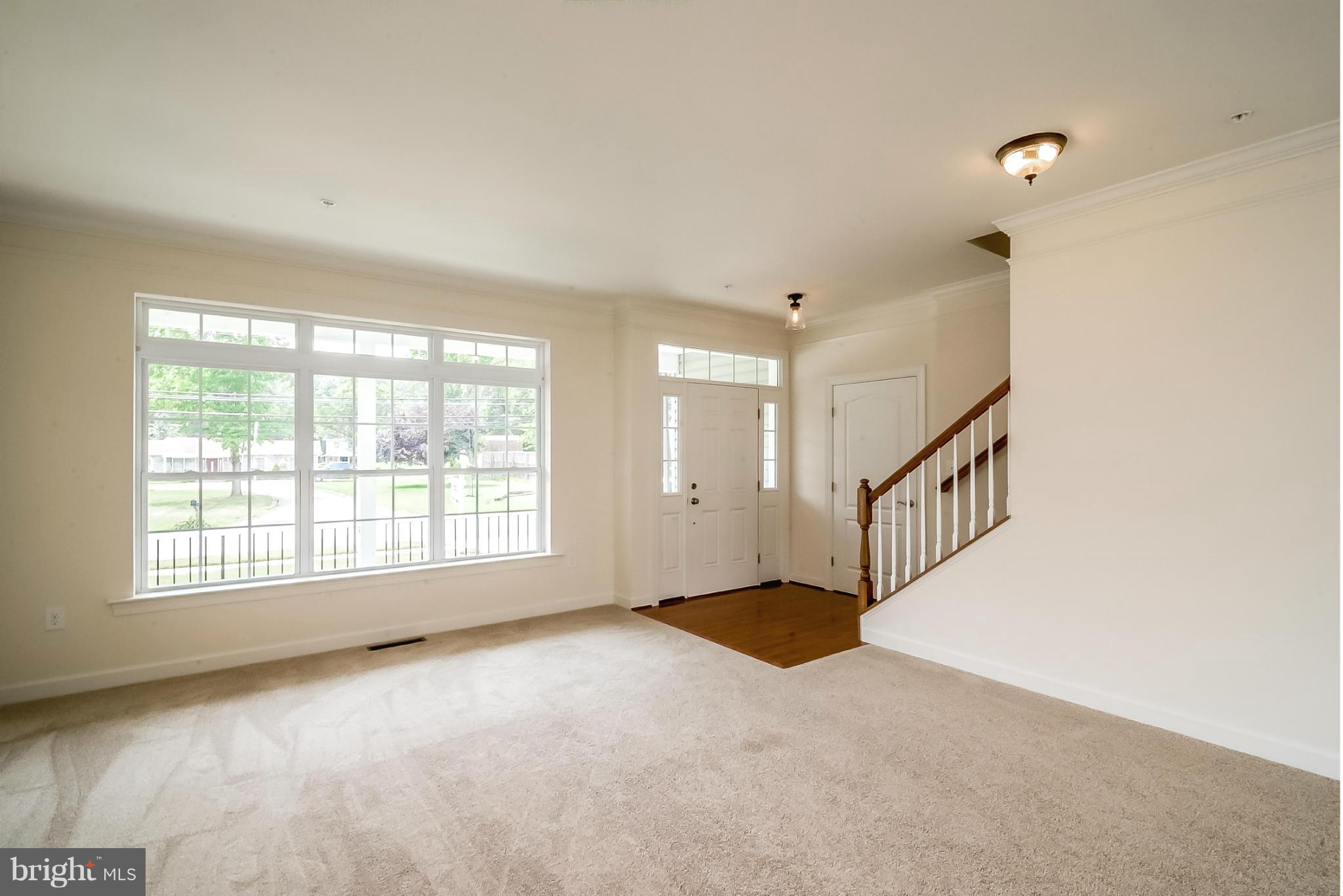 8325 Jacobs Road West Severn, MD 21144 - Photo 4 of 27 LIVING ROOM AND FOYER