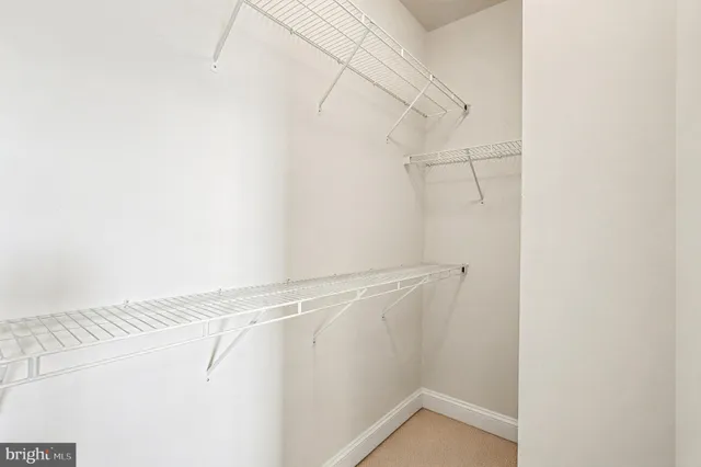 a bathroom with a shower sink and mirror