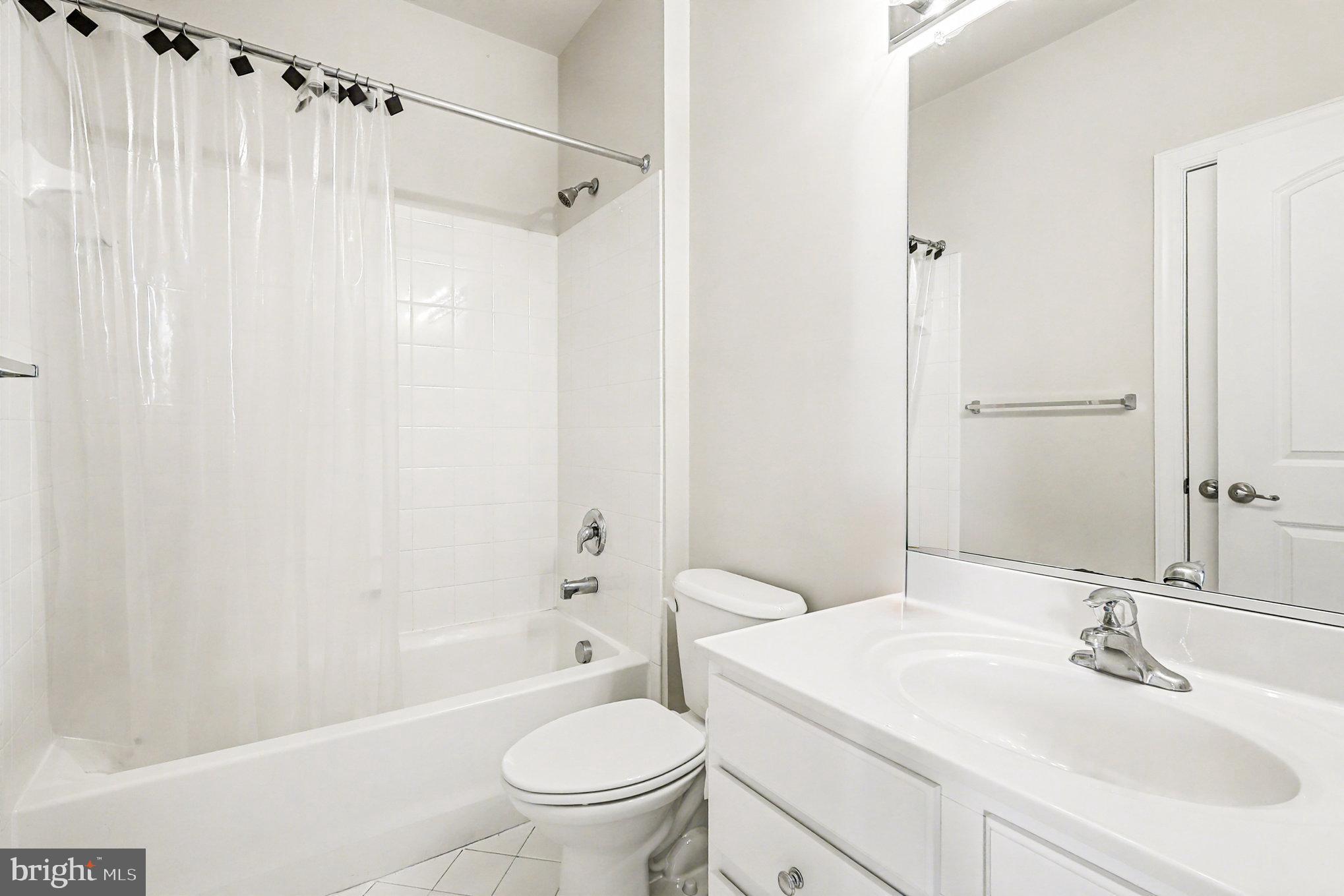 2228 Merseyside Drive Woodbridge, VA 22191 - Photo 19 of 24 a bathroom with a sink toilet and shower