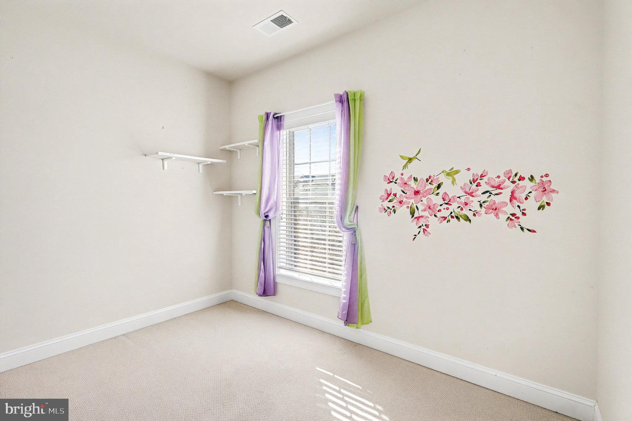 2228 Merseyside Drive Woodbridge, VA 22191 - Photo 20 of 24 a view of a room with a chandeliers