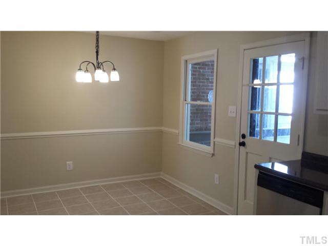 5586 Hamstead Crossing Raleigh, NC 27612 - Photo 8 of 21 a bathroom with a sink and a mirror