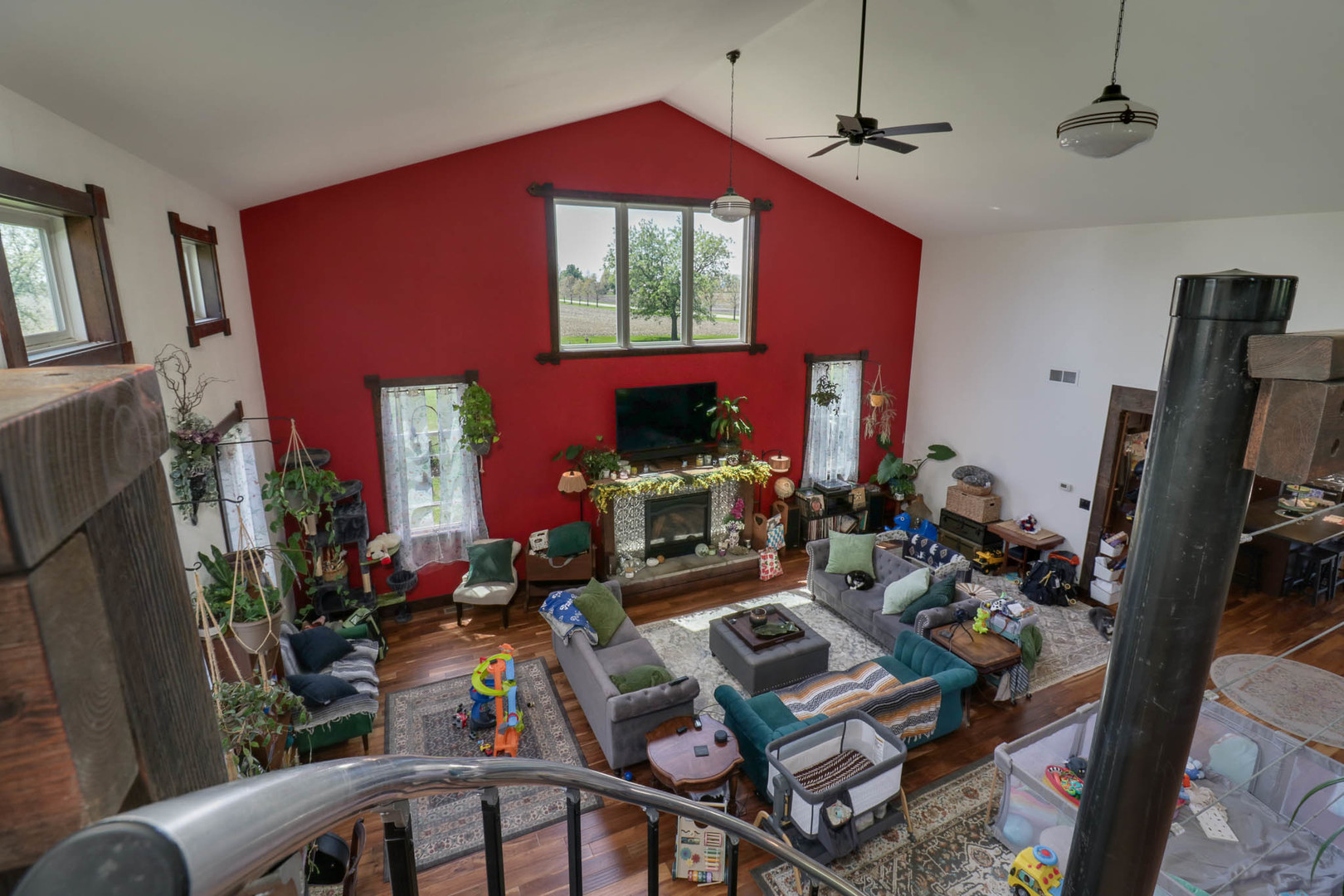 12014 Prairie Center Road Clinton, IL 61727 - Photo 15 of 56 a living room with furniture a window and a flat screen tv