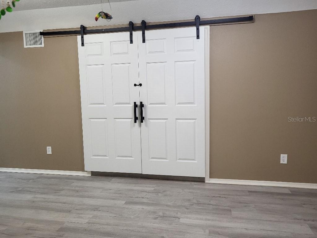 995 Emerald Drive Mount Dora, FL 32757 - Photo 13 of 49 a view of a livingroom with wooden floor
