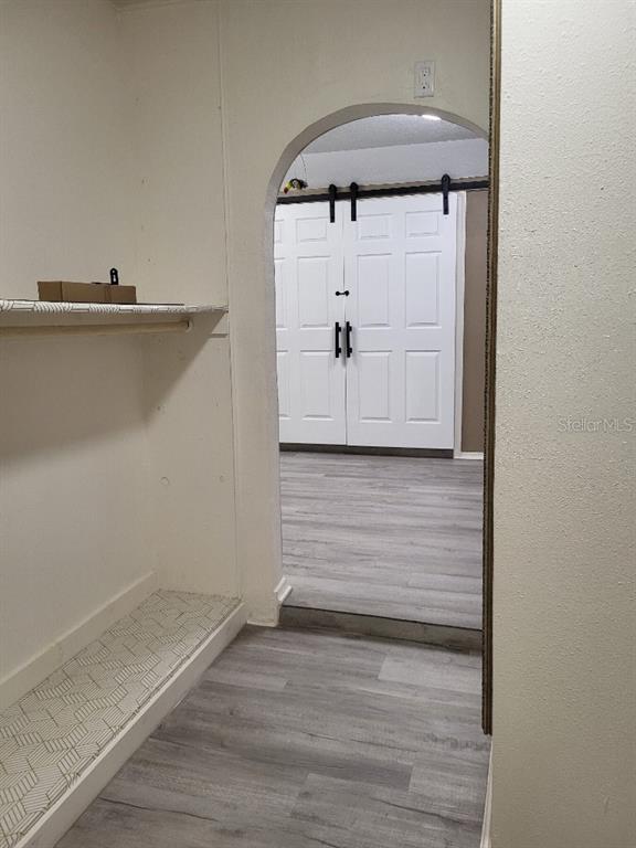 995 Emerald Drive Mount Dora, FL 32757 - Photo 14 of 49 wooden floor in an empty room