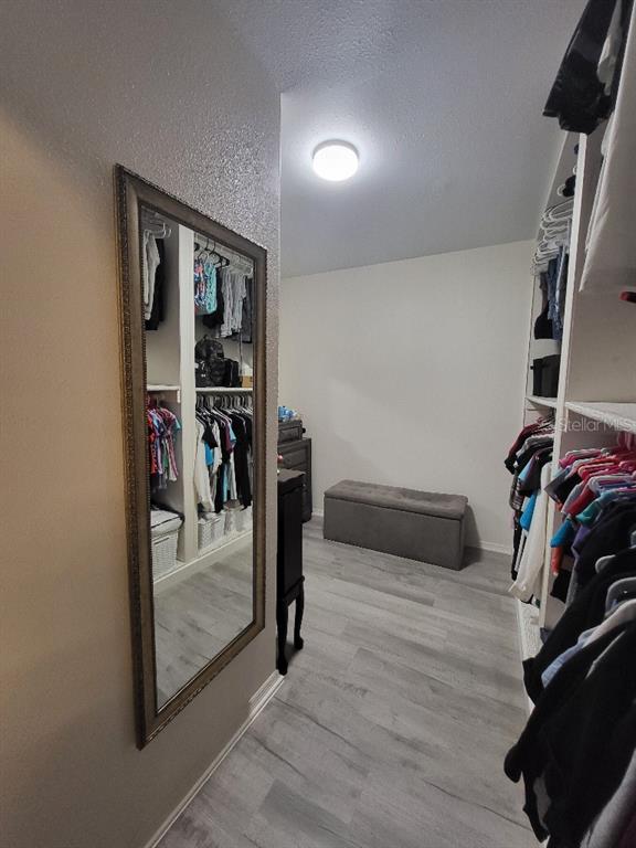 995 Emerald Drive Mount Dora, FL 32757 - Photo 17 of 33 a view of a room with gym equipment