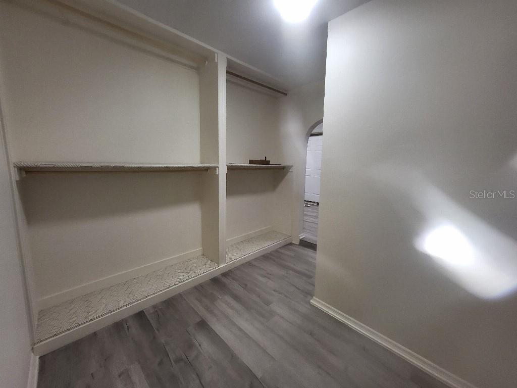 995 Emerald Drive Mount Dora, FL 32757 - Photo 18 of 49 a view of an empty walk in closet