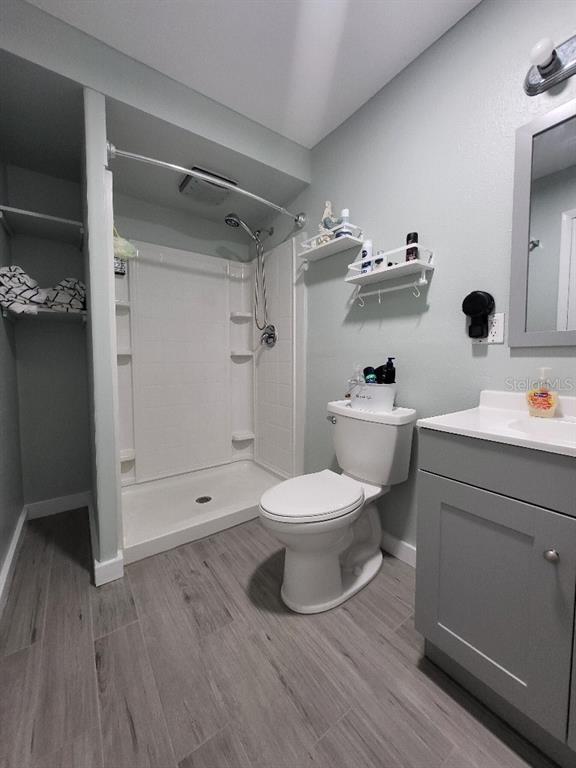 995 Emerald Drive Mount Dora, FL 32757 - Photo 21 of 33 a bathroom with a toilet and a shower