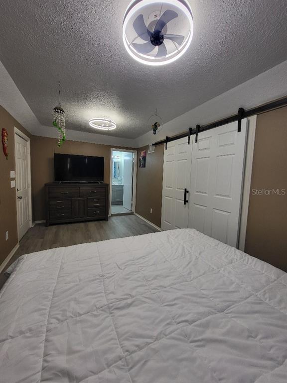 995 Emerald Drive Mount Dora, FL 32757 - Photo 24 of 33 a view of empty room with wooden floor