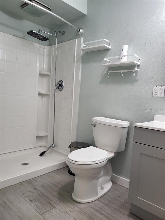 995 Emerald Drive Mount Dora, FL 32757 - Photo 24 of 49 a bathroom with a toilet and a shower