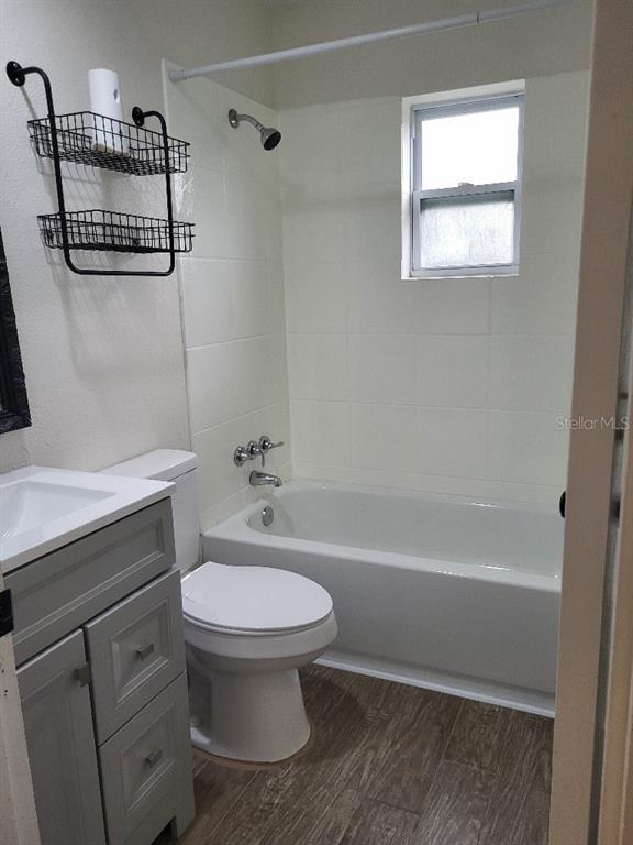 995 Emerald Drive Mount Dora, FL 32757 - Photo 41 of 49 a bathroom with a sink a toilet and shower