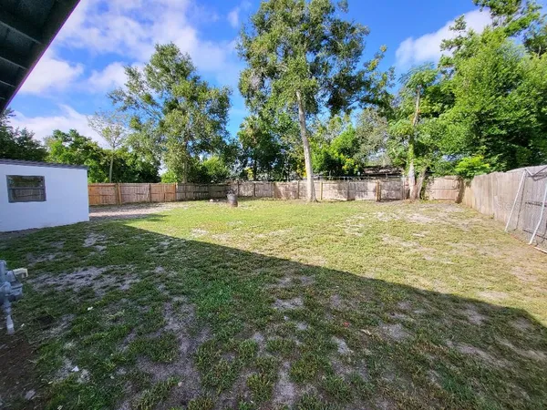 a view of a backyard with a garden