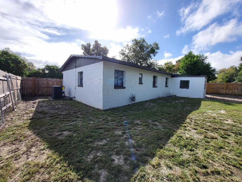 995 Emerald Drive Mount Dora, FL 32757 - Photo 9 of 33 a view of a house with a yard