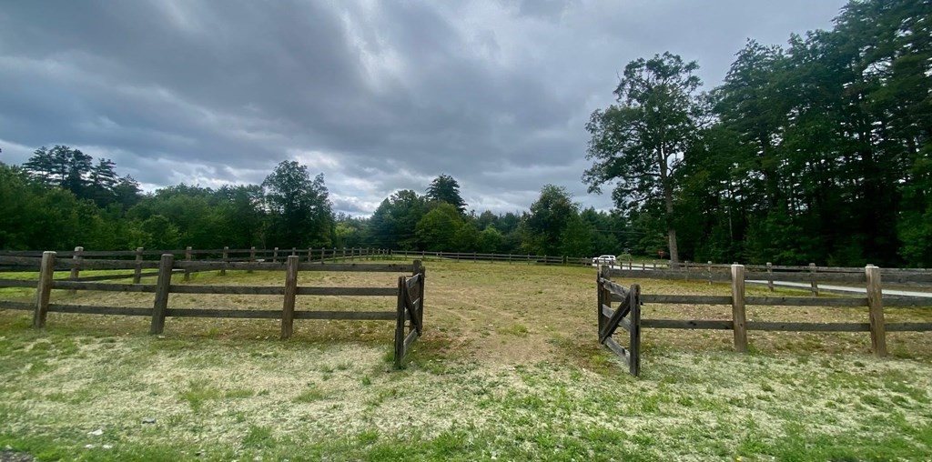 4 Savannah Way Amherst, NH 03031 - Photo 6 of 8 a view of a bench in a garden