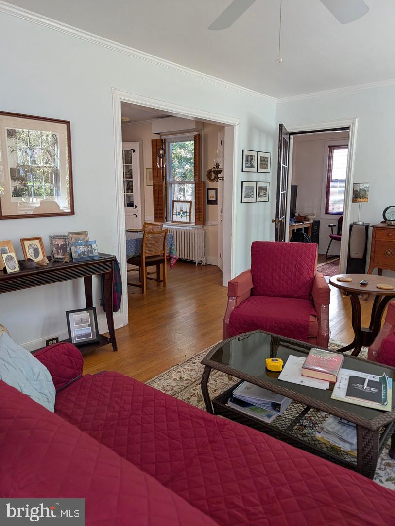 4413 Ridge Street Chevy Chase, MD 20815 - Photo 15 of 38 living room with doors to dining room and den