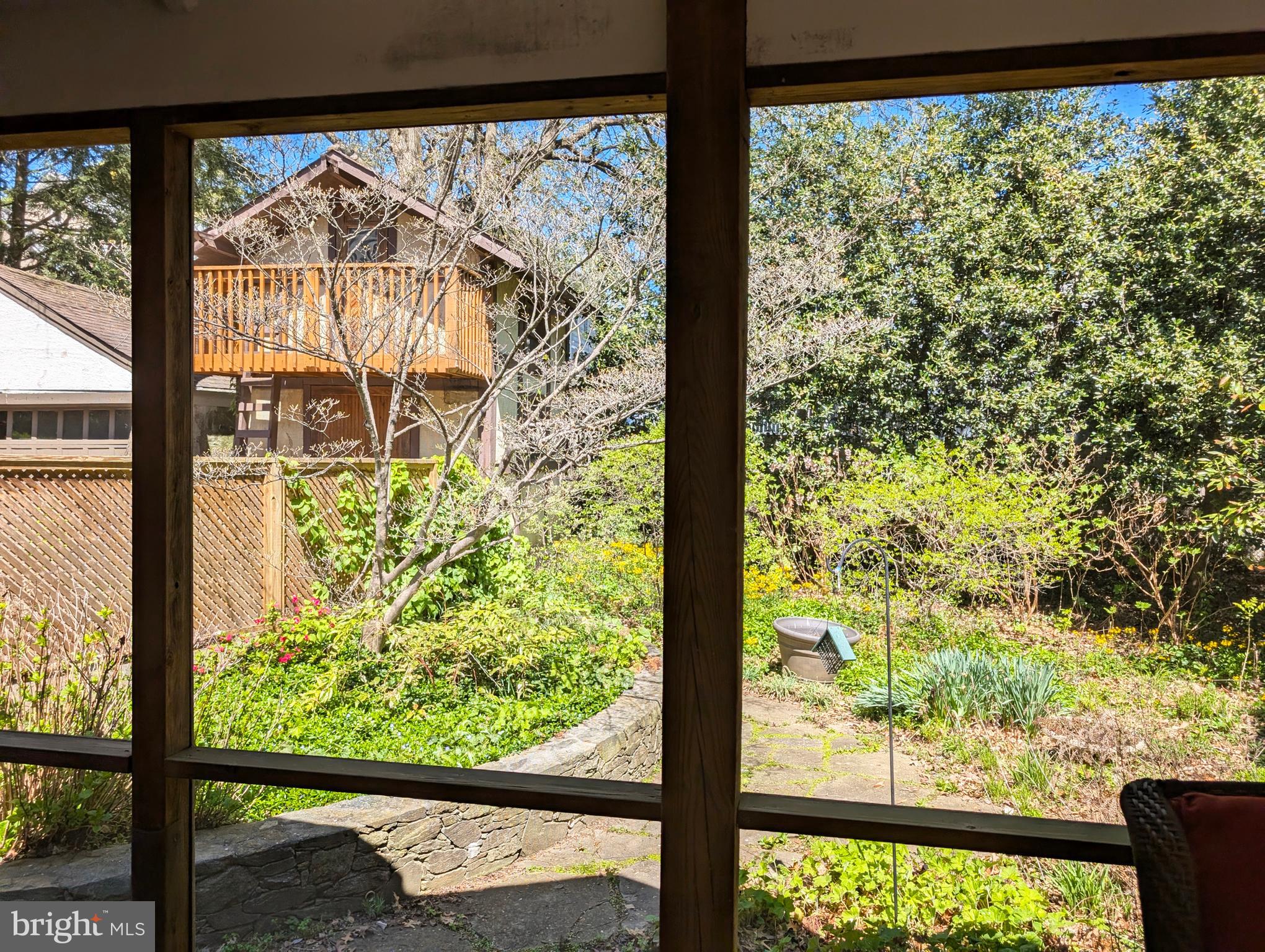 4413 Ridge Street Chevy Chase, MD 20815 - Photo 19 of 38 Porch looking to native plant garden and playhouse