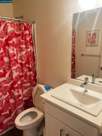 a bathroom with a sink and a toilet