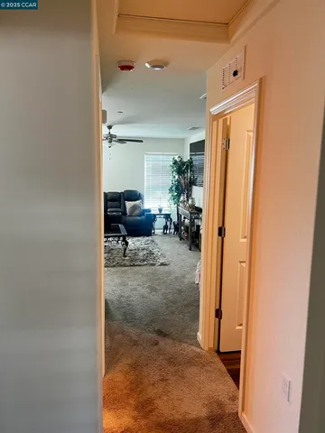 a room with a door open to a room