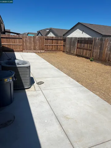 a view of a garage with a white car