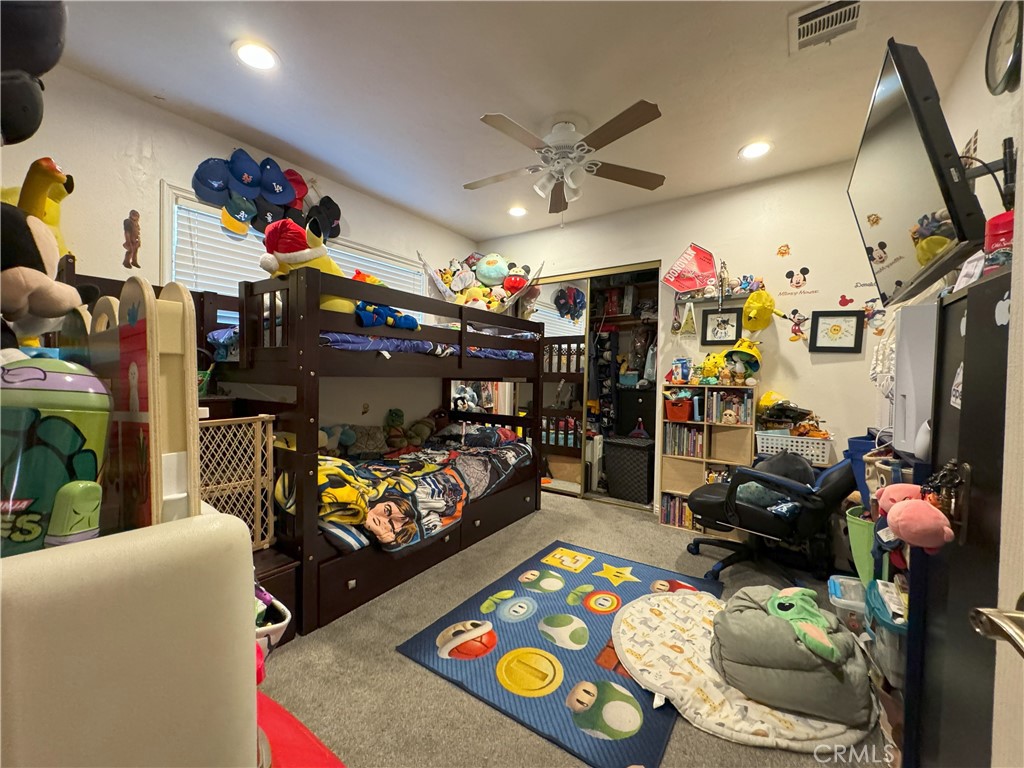 8429 Sheffield Road San Gabriel, CA 91775 - Photo 13 of 19 a living room filled with furniture and a flat screen tv