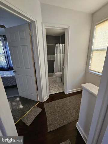 a view of living room with furniture and window