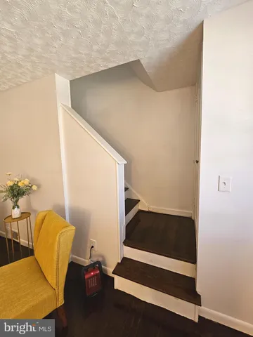 a view of entryway with stairs