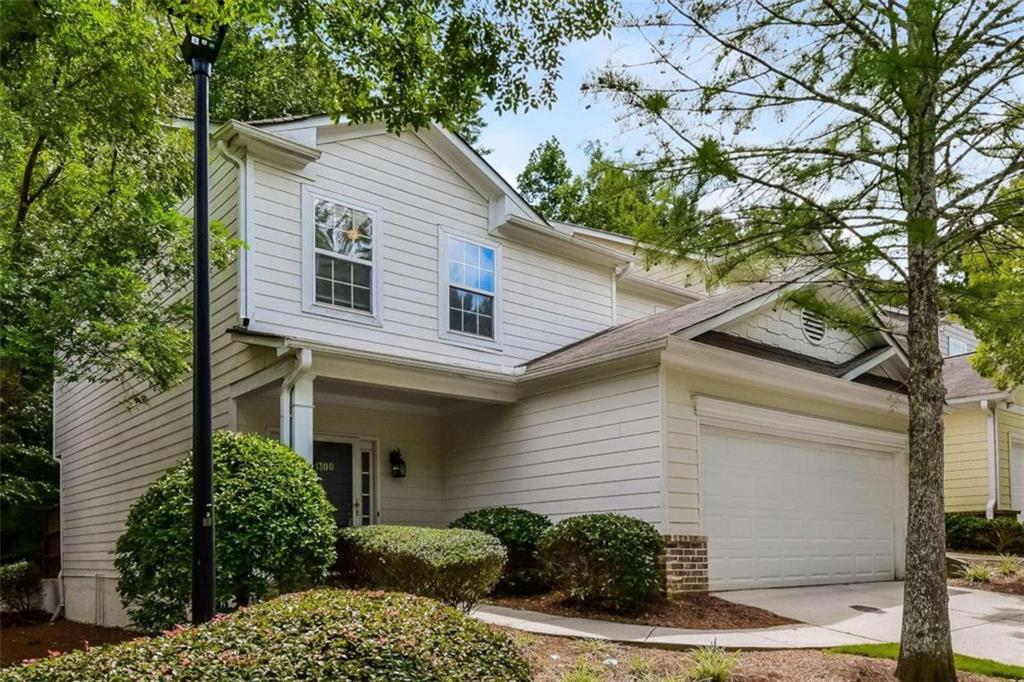 1300 Suttles Drive Southwest Atlanta, GA 30331 - Photo 1 of 1 a front view of a house with a tree