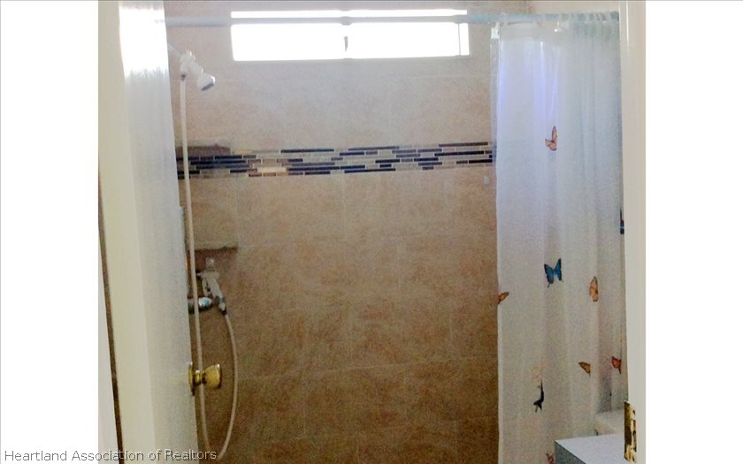 2813 Brunns Road, Unit 8 Sebring, FL 33872 - Photo 8 of 17 Tiled walk in shower